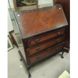 An early 20th century period style mahogany bureau with fall front and 3 drawers, on cabriole legs