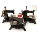 Three early 20th century child's sewing machines