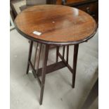 A Mahogany circular inlaid table with Arts and Crafts style base and another oak drop leaf table