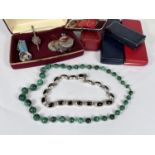 A malachite bead necklace; a Mexican silver and onyx necklace; a hallmarked silver Scottish