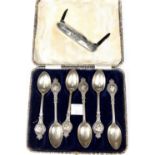 A cased set of George VI coronation hallmarked silver coffee spoons, circa 1936; an Edward VII