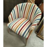 A modern tub shaped armchair cream stripe upholstery