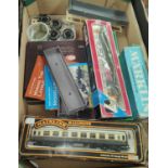 00 gauge in 2 boxes, rolling stock, coaches inc. 2 mainline, 4 engines inc. Marklin V160, Mehano