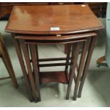A nest of 3 mahogany occasional tables