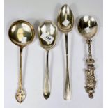 Three large silver spoons/servers, various dates; an anointing spoon with UK import marks, 13oz