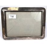 A silver plain rectangular photo frame, Birmingham 1918, 25 x 18cm