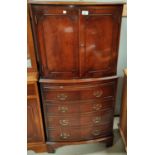 A reproduction mahogany drinks cabinet