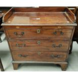 A 19th century Sheraton style bachelors chest of 3 drawers, inlaid and crossbanded, with raised