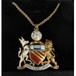 An enamelled 15ct hallmarked gold pendant depicting the Manchester Coat of Arms 8.7gm on fine