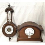An Edwardian aneroid barometer and thermometer in carved walnut case; an Edwardian striking mantel