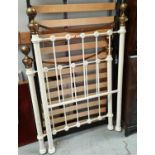 A Victorian style white metal and brass single bed