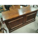 A 1930's oak panelled blanket box