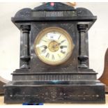 A 19th century mantel clock in architectural ebonised and marble effect case, with American striking