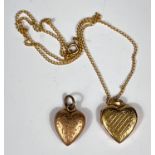 A 9ct hallmarked gold heart locket on fine chain, 5.5gm and a gold plated heart locket.