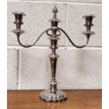 A silver plated three branch candelabra in the rococo manner, fattorini & Sons.