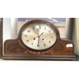 An early century mantel clock with strike in mahogany lancet top case; 2 1930's striking mantel