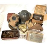 Two 1914 cigarette boxes; a British WWII helmet; militaria; etc.