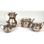 A hallmarked silver 4 piece tea set of baluster form with pierced rims and gadrooned borders,