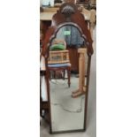 A mahogany period style pier mirror, the frame with shaped arched top and shell frieze; a 19th