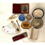 A mosaic topped gilt powder pot, a boxed shell shaped metal purse, an Ambrotype, other collectables