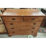 An 18th century style stained mahogany chest of 3 long and 2 short drawers and a wall mirror in