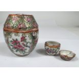 A Chinese can top barrel shaped lidded pot, ht. 8cm, miniature version inside (a.f), a similar vase,