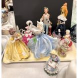 A selection of Royal Doulton, Coalport and other porcelain figures