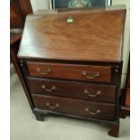 A Georgian style mahogany bureau with fall front and 3 drawers under