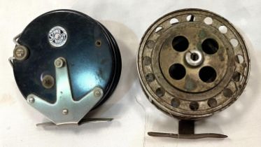 A vintage 4.1/4" fishing reel and a Strike Right reel