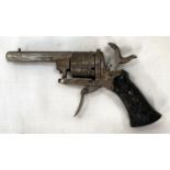 A 19th century Belgian pin fire six shot revolver with carved grip and etched metalware, stamped 644