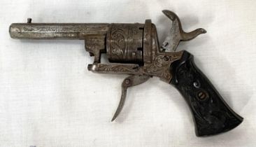 A 19th century Belgian pin fire six shot revolver with carved grip and etched metalware, stamped 644