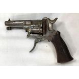 A 19th century Belgian pin fire six shot revolver, stamped length 14cm, chequered grip.