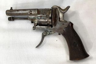 A 19th century Belgian pin fire six shot revolver, stamped length 14cm, chequered grip.