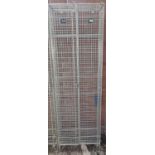 A Industrial double compartment steel cage locker