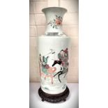 A Chinese famille vert Rouleau shaped vase with sages on animals, circle mark to base, ht. 43cm with