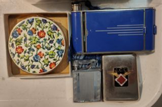An Art Deco combination compact/cigarette case/lipstick case in the form of a camera in blue;