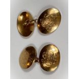 An 18 carat hallmarked gold pair of cufflinks, monogrammed, 13gm