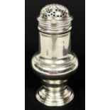 A mid Georgian silver muffineer, ringed baluster form, pierced top with foliate engraving, London