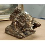 An unusual gilded bronze spill vase in the form of a figure, a drunken basket carrier slumping