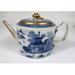 A Chinese export blue and white teapot with over twisted handle, gilt and blue and white