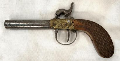 A 19th century percussion cap muff pistol with chequered wooden grip, brass and steel, length 18cm.