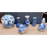 A selection of blue and white Chinese vases, ginger jars etc