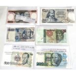 A selection of banknotes from Brazil, Portugal, Italy and Greece