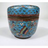 A Chinese 19th century turquoise ground lidded circular pot with two cranes to the lid, fans and