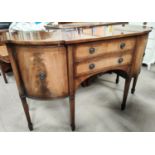 A George III style sideboard of 2 cupboards and 2 drawers in crossbanded mahogany