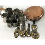 A 19th century copper warming pan and kettle; horse brasses; pewter tankards; etc.