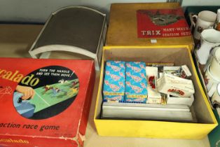 A Tri-ang 00 gauge railway in original box; a boxed set of points; an Escalado game, boxed