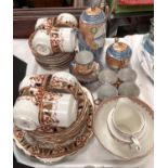 A Victorian Imari pattern tea service, another similar and a Japanese egg shell porcelain set