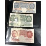 An album of GB and foreign banknotes: £5 notes: Gill, Page and Salmon, £1 notes: blue Peppiatt,