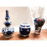 Three small Chinese items, two vases and a barrel shaped pot, hts. 12.5cm, 11cm and 6cm